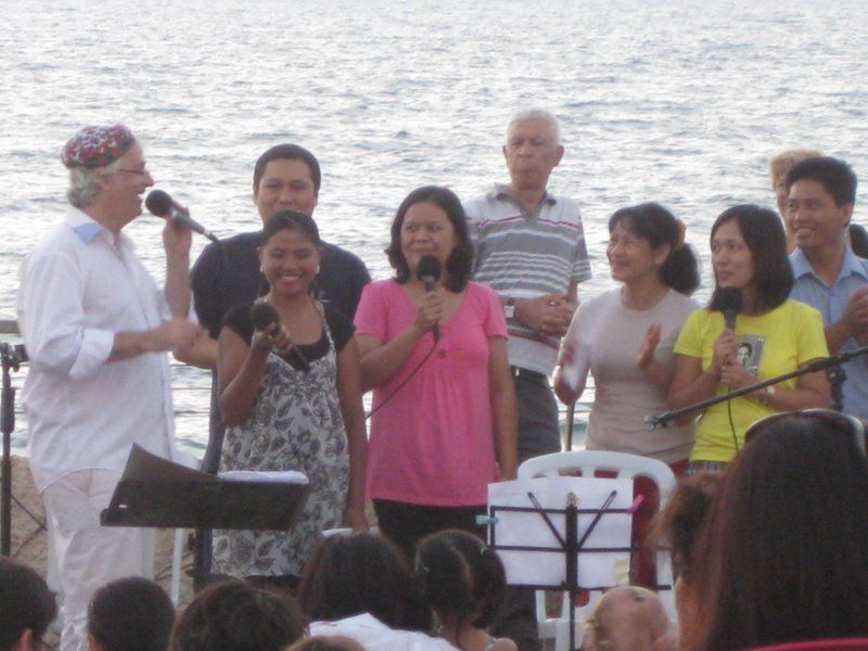 Guests singing at Friday evening service