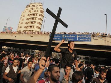 Angry Egyptian Christians protest outside St. Mark's Cathedral against the military ruling council, in Cairo on October 10, 2011 (AFP Photo / Mahmud Hams)