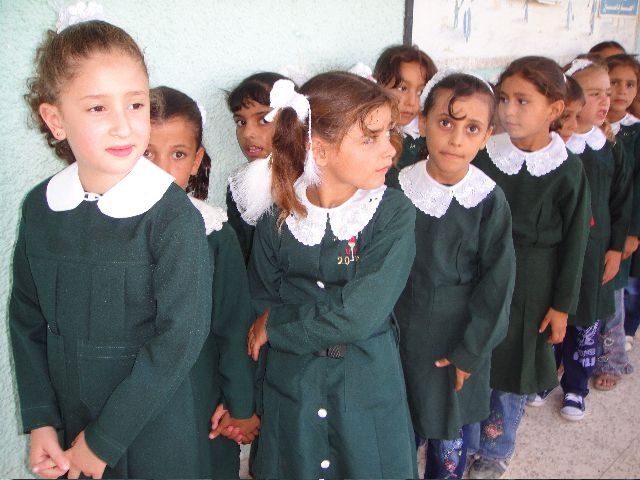 Girls at a school in Gaza. Those over the age of nine will be forbidden from interacting with male students and teachers.